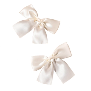 Pair of elegant ivory satin bow hair clips for bridal wedding hairstyles and hair accessories
