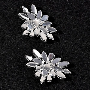 Close-up of the metal clip mechanism on silver floral glass rhinestone bridal shoe buckles