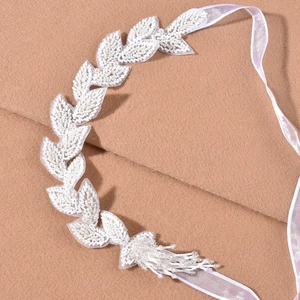 Handmade beaded bridal headband with leaf patterns and elegant beaded tassels