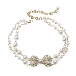 Élégant collier de perles à double rangée avec un pendentif nœud en strass brillant