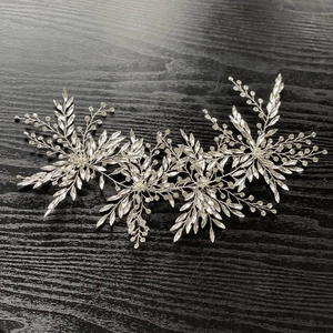 Elegant silver star and leaf bridal headband with sparkling rhinestones for wedding dresses
