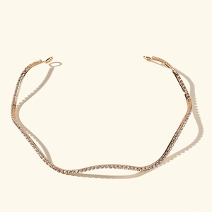 Serre-tête ondulé élégant plaqué or avec des strass blancs étincelants pour femmes