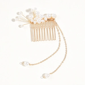 Detailed close-up of gold pearl tassel hair comb with elegant dangling metal chains