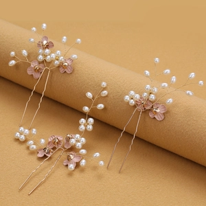 Three-piece bridal hair pins set with gold wire pearls and pink fabric flowers