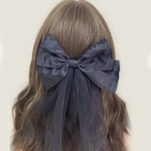 Navy blue satin and mesh oversized bow hair clip with elegant long veil streamers