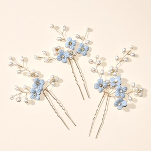 Three-piece bridal hair pin set with light blue fabric flowers and faux pearls