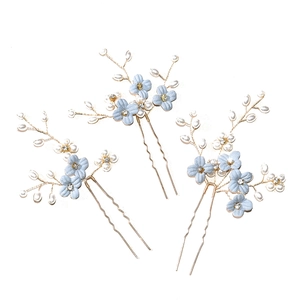 Set of three blue flower bridal hair pins with pearls and rhinestones for wedding styling