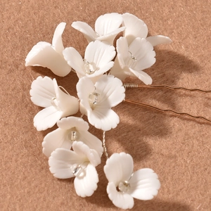 Handmade white lily of the valley bridal hair pin with golden U-shaped wire and beads