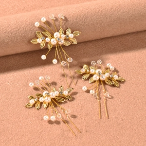 3-piece bridal pearl hair pins set with golden olive leaves and crystals on velvet