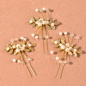 Three-piece bridal hair pins set with golden olive leaves and elegant pearls
