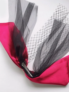 Elegant burgundy satin bow and black mesh veil bridal hair clip for wedding ceremonies