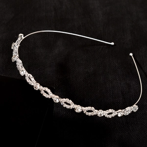 Elegant bridal silver hair hoop with sparkling rhinestones and infinity wave design