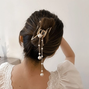 Elegant gold metal hair claw clip with white pearls and long tassel pendants for women