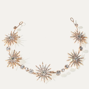 Golden bridal headband featuring sparkling star motifs and rhinestones for wedding accessory