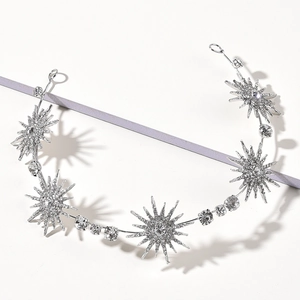 Silver bridal headband with sparkling rhinestone stars and crystals for wedding hairstyles