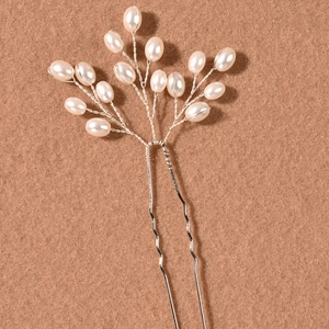 Elegant bridal pearl hair pin with silver wire branches and wavy U-shaped base