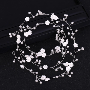 Handmade bridal hair vine with white flowers and pearls for wedding dress decoration