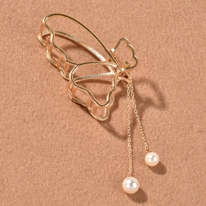 Elegant gold butterfly hair claw clip with long pearl tassel strands for women