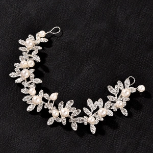 Elegant bridal hair band with silver leaf design, sparkling rhinestones and white pearls