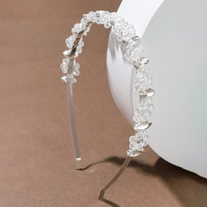 Close-up of bridal crystal flower headband with marquise rhinestones on silver metal base