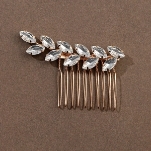 Bridal gold hair comb with marquise cut rhinestones in a leaf design for weddings