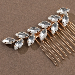 Elegant gold bridal hair comb with marquise cut crystals in a floral leaf pattern
