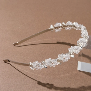 Elegant bridal headband with silver metal frame and sparkling crystal flower marquise beads