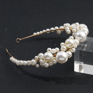 European vintage bridal headband featuring white pearls and golden wires for wedding
