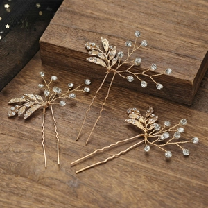 Trois épingles à cheveux dorées avec feuilles et cristaux pour coiffure mariée