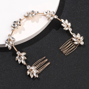 Peigne à cheveux de mariée doré avec feuilles en strass sur fond noir et blanc élégant