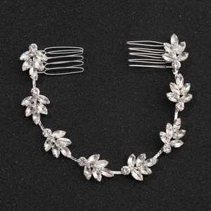 Peigne à cheveux élégant pour mariée avec feuilles en strass sur base en métal argenté