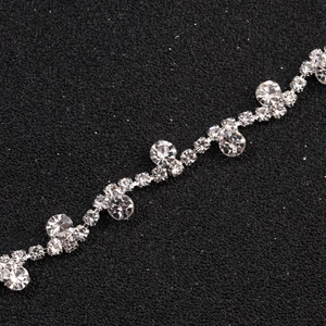 Sparkling silver chain hair accessory with clear rhinestones for bridal wedding hairstyles