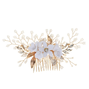 Elegant bridal hair comb with white ceramic flowers, pearls and rhinestones on gold base