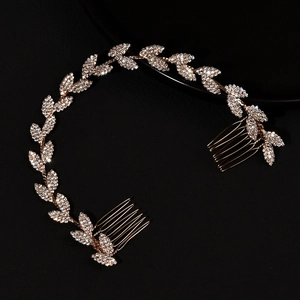 Elegante tralcio per capelli da sposa dorato con foglie di strass e doppi pettini