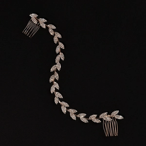 Elegante vite per capelli da sposa con design a foglia argento e strass scintillanti