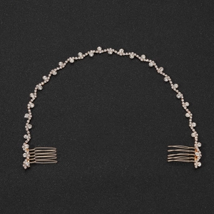 Detail of bridal gold hair chain with dual side combs and sparkling white rhinestones
