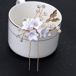 Épingle à cheveux en U avec fleurs blanches, feuilles d'or et cristaux élégants
