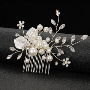 Elegant silver leaf hair comb with handmade white pearls and rhinestones for weddings