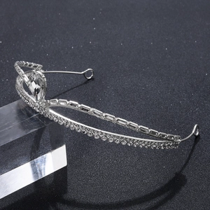 Elegant silver alloy crown headpiece with sparkling heart-shaped crystal and rhinestones