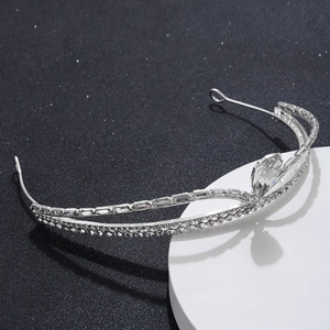 Elegant silver tiara with sparkling rhinestones and a central teardrop crystal