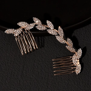 Elegant gold bridal hair comb set with sparkling rhinestones in leaf and butterfly design