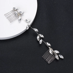 Macro shot of silver bridal hair vine with crystal marquise rhinestones and dual combs