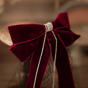 Elegant wine red velvet wedding hair bow with rhinestone chain and black mesh veil