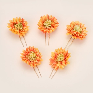 Detail view of 5-piece bridal orange gradient silk flower hair pins with golden U-shaped stems