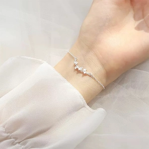 Elegant 925 silver bracelet featuring three sparkling butterfly charms on a thin chain