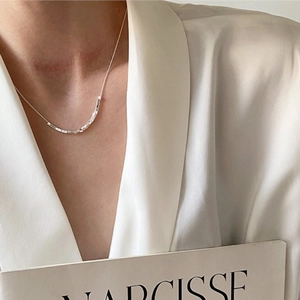 Minimalist S925 sterling silver square bead choker necklace on model in white silk shirt