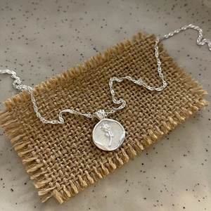 S925 sterling silver rose coin pendant necklace with water wave chain on vintage linen