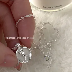 S925 sterling silver necklace with rose relief pendant on white enamel on water wave chain