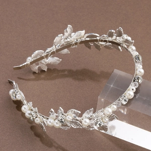 Elegant silver leaf headband with white pearls and sparkling crystals for brides