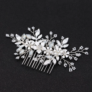 Silver floral bridal hair comb with blue opal stones and white beads for weddings